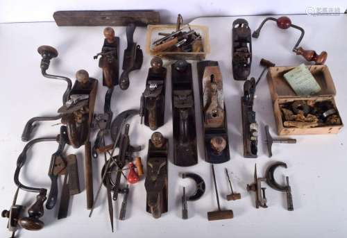 A collection of Vintage planes, gauges and hand drills, etc....