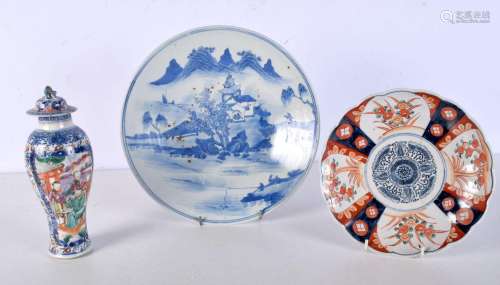 A 19th Century Chinese blue and white plate depicting a land...