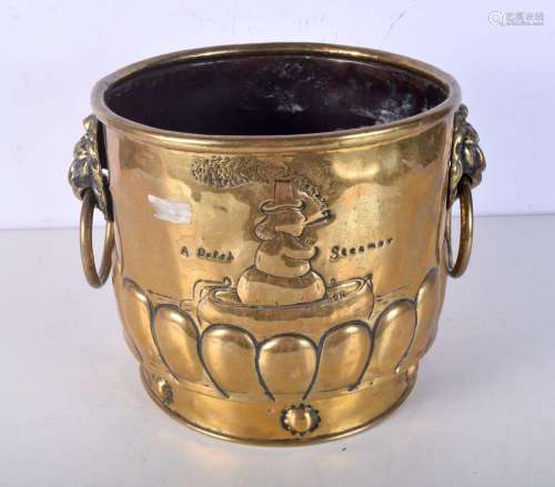 An early Dutch Steamer brass bucket with lions head handles....