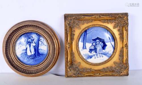 A pair of carved framed continental porcelain plaques depict...