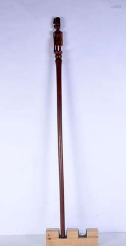 A carved wooden North African Colonial style walking cane. 1...