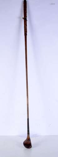 An antique hickory shafted R Forgan golf wood. 112cm.