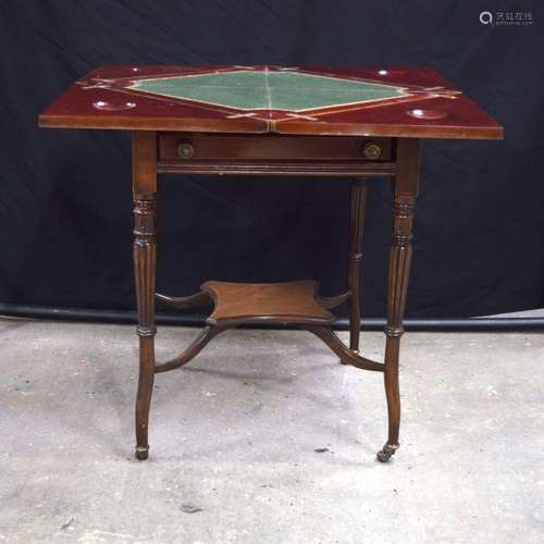 A Mahogany one drawer folding games table 72 x 56 cm.