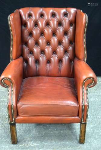 A Leather armchair 96 x 67 x 66 cm