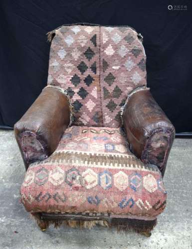 An Arthur Jones and Son arm chair . 90 x 90 x 66 cm.