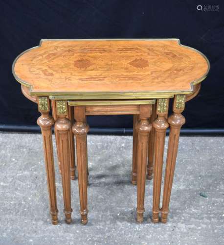 A nest of marquetry topped table with brass edging 60 x 66 x...