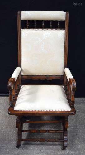 A mahogany upholstered nursing chair 106 x 74 x 55 cm.