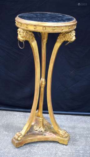 A Regency gilt wood stand with lion head supports 109 x 46 c...