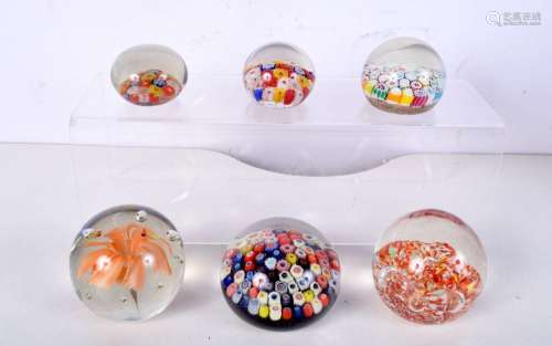 A collection of Millefiori paperweights together with two ot...