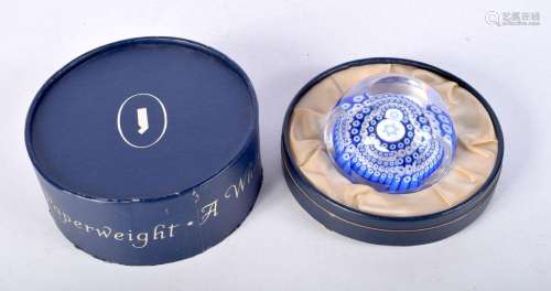 A boxed Whitefriars paperweight with concentric faceted blue...