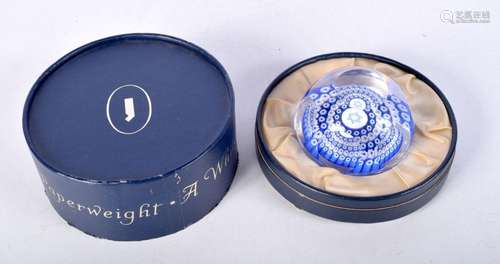 A boxed Whitefriars paperweight with concentric faceted blue...