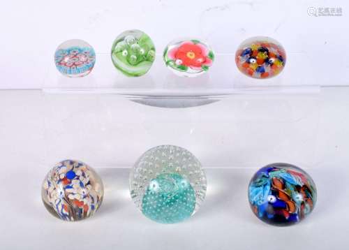 A collection of paperweights including Caithness Moon crysta...