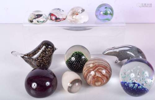 A collection of paperweights including Wedgewood bird, Langh...