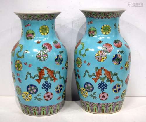 A pair of large Chinese Porcelain polychrome vases decorated...