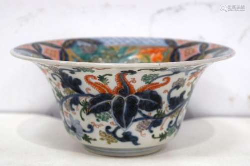 A small Chinese porcelain polychrome bowl decorated with fol...