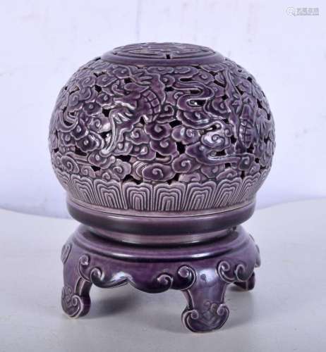 A Chinese porcelain purple glaze openwork incense burner dec...