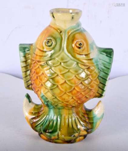 A Chinese glazed pottery vase in the shape of a fish. 14cm.