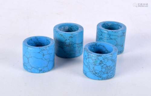 A collection of Chinese turquoise stone archers rings. Large...