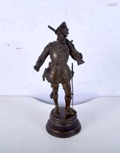 A small bronze model of a Spanish conquistador, signed E. Gu...