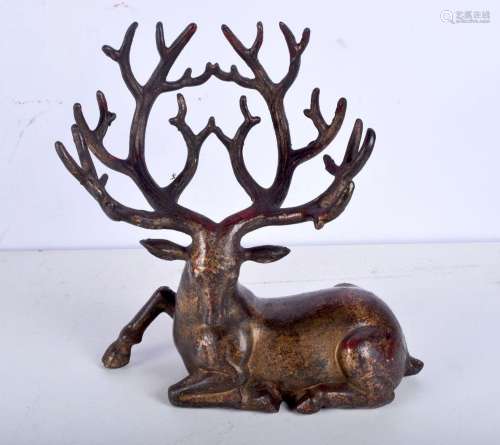 A large gilded bronze figure of a stag. 23 x 20cm.