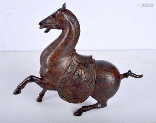 A large gilded bronze of a rearing horse. 22 x 25cm.