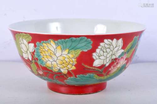 A small Chinese porcelain red ground vase decorated with flo...