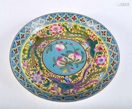 A Chinese porcelain polychrome dish decorated with peaches a...