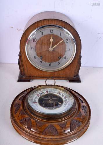 A small Art Deco style wooden mantel clock together with a c...