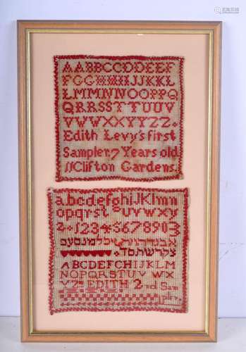 An antique framed sampler. 19 x 20cm.