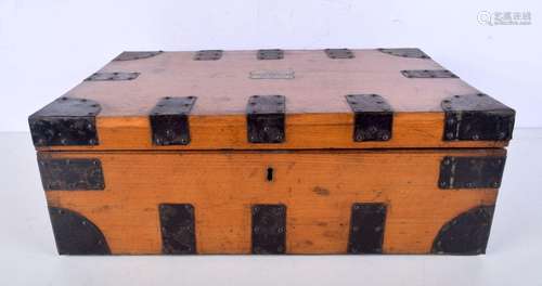 A metal bound wooden box with a Royal Naval officers name on...