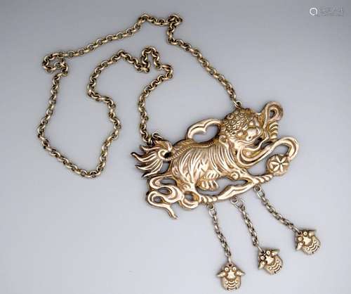 A Chinese white metal beast pendant on a chain ,Pendant 11 x...