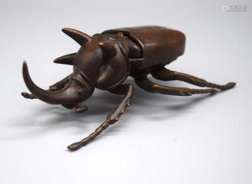 A Japanese bronze stag beetle 11 cm.