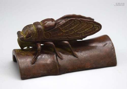 A Japanese bronze locust 6 cm.