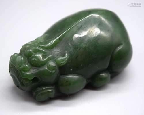 A Chinese carved Jade boulder in the form of a crouching bea...