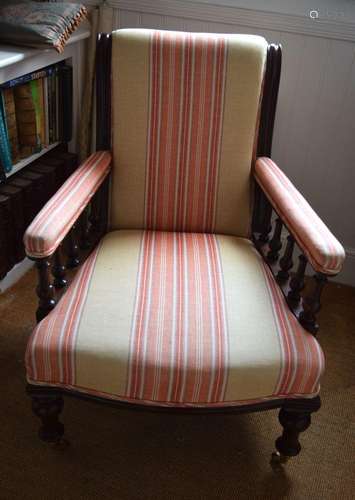 A LATE VICTORIAN UPHOLSTERED LIBRARY CHAIR. 94 cm x 83 cm.