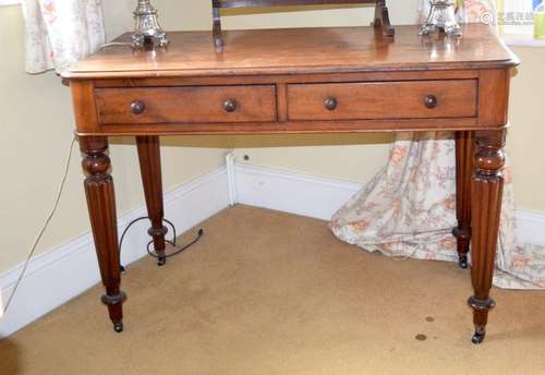 A GEORGE III MAHOGANY TWO DRAWER DESK. 71 cm x 105 cm x 51 c...