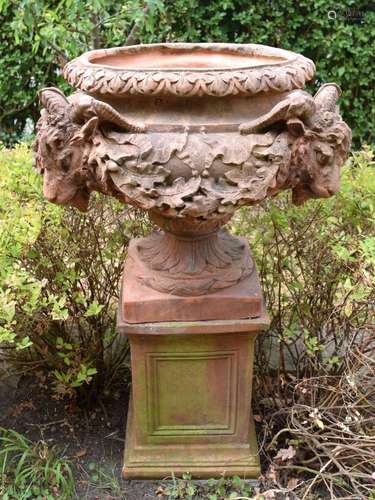 A FINE LARGE COUNTRY HOUSE CARVED TERRACOTTA PEDESTAL URN ON...