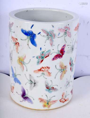 A Chinese p[porcelain brush pot decorated with butterfly 15c...