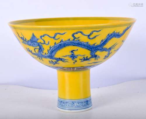 A Chinese porcelain Imperial yellow Stem cup decorated with ...