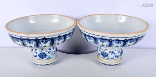 A pair of Chinese porcelain blue and white candlesticks deco...