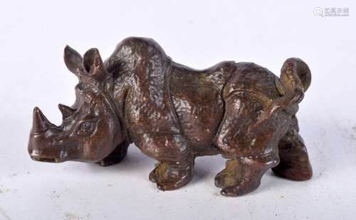 A Japanese bronze Rhinoceros 4 x 7.5cm.