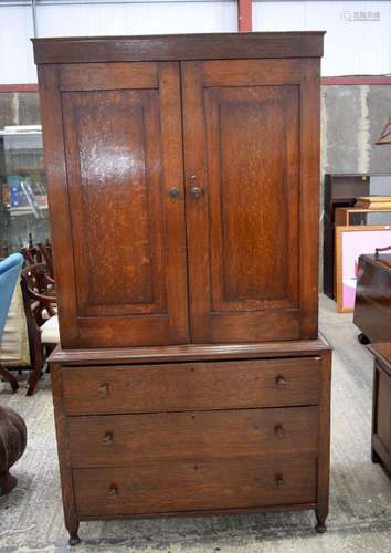 A large Mid century oak Linen press with three drawers 191 x...