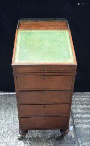 A rare miniature 4 drawer Regency Davenport with brass galle...