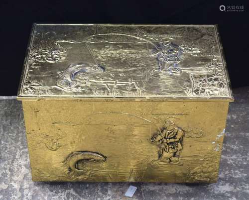 A large hammered brass covered wooden box with hinged lid de...