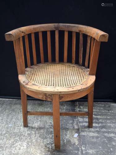 A Provincial Chinese chair with a Wicker seat 75 x 60 cm