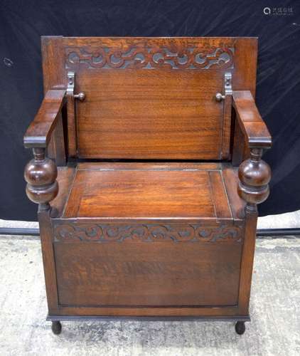 An antique Monks seat table 80 x 76 x 46 cm.