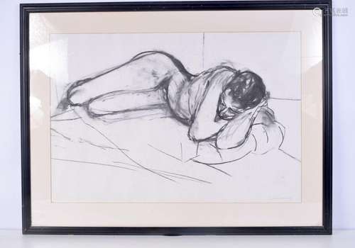 A large framed charcoal drawing of a naked female indistinct...