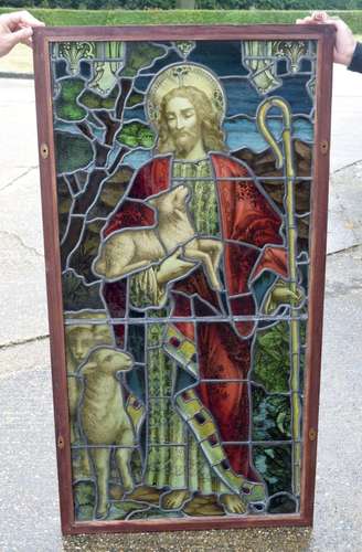 A framed leaded religious themed stain glass panel (Provenan...