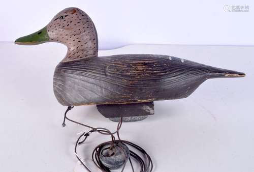 A vintage wooden lead weighted decoy duck 22 x 42 cm.