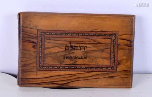 An unusual Israeli inlaid wooden bound book containing 12 ex...